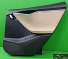 Tesla Model 2012-2016 Rear Door Trim Black/tan Right, Pass 1008105-09-K. Fixed Price $125.00.