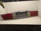 Tail Light Lid Mounted Without Deluxe Trim Fits 00-05 Lesabre 1077838. Fixed Price $215.00.