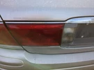 2000-2005 Buick Lesabre Driver Left Side Deck Lid Mounted Tail Light Cfcit. Fixed Price $99.97.