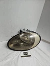 Driver Left Headlight Thru 6/9/98 Fits 96-98 Taurus 67473. Fixed Price $40.00.